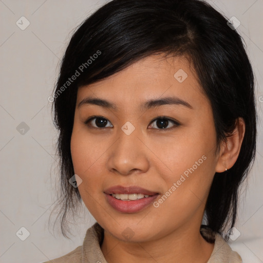 Joyful asian young-adult female with medium  brown hair and brown eyes