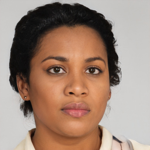 Neutral latino young-adult female with short  brown hair and brown eyes
