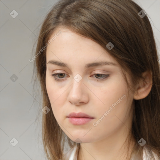 Neutral white young-adult female with long  brown hair and brown eyes