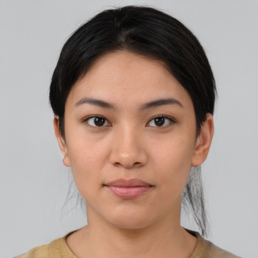 Neutral asian young-adult female with medium  black hair and brown eyes