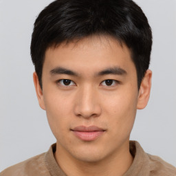 Neutral asian young-adult male with short  brown hair and brown eyes