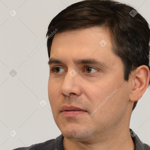 Neutral white adult male with short  brown hair and brown eyes