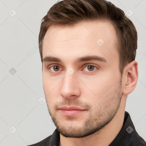 Neutral white young-adult male with short  brown hair and grey eyes