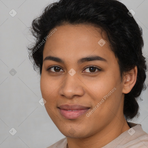 Joyful latino young-adult female with medium  black hair and brown eyes