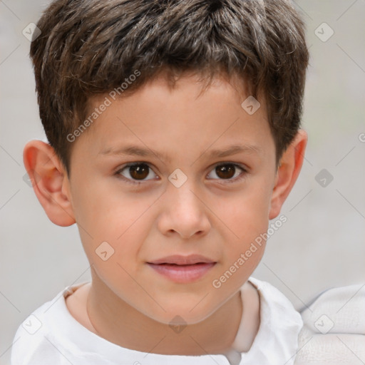 Joyful white child male with short  brown hair and brown eyes