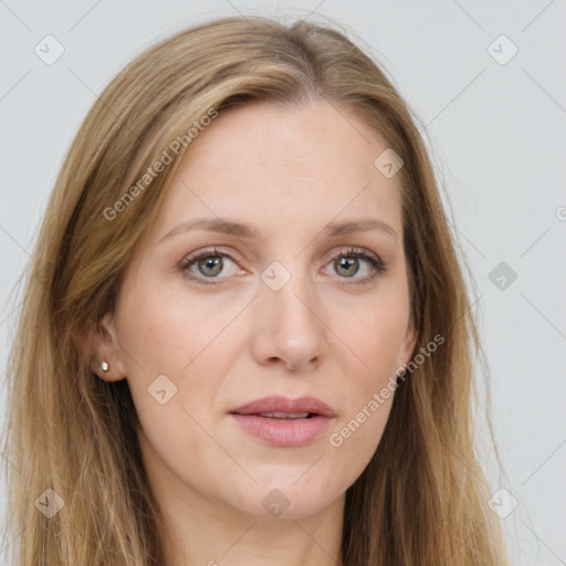 Joyful white young-adult female with long  brown hair and green eyes