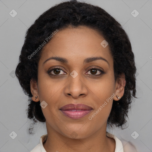 Joyful black young-adult female with medium  brown hair and brown eyes