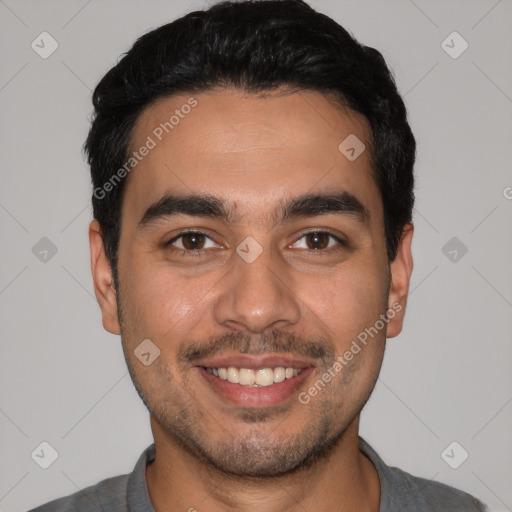 Joyful white young-adult male with short  black hair and brown eyes