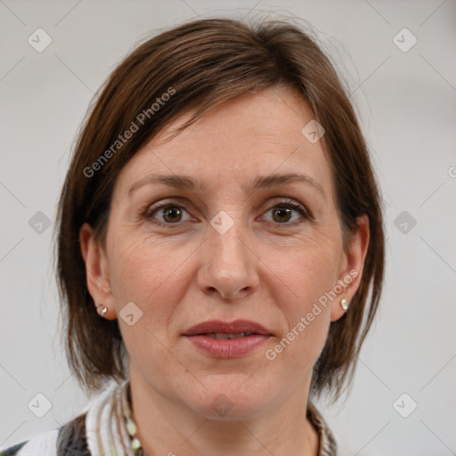 Joyful white adult female with medium  brown hair and grey eyes