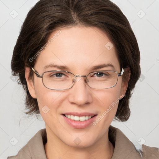 Joyful white adult female with medium  brown hair and grey eyes