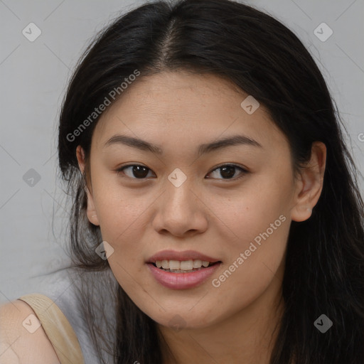 Joyful asian young-adult female with long  brown hair and brown eyes