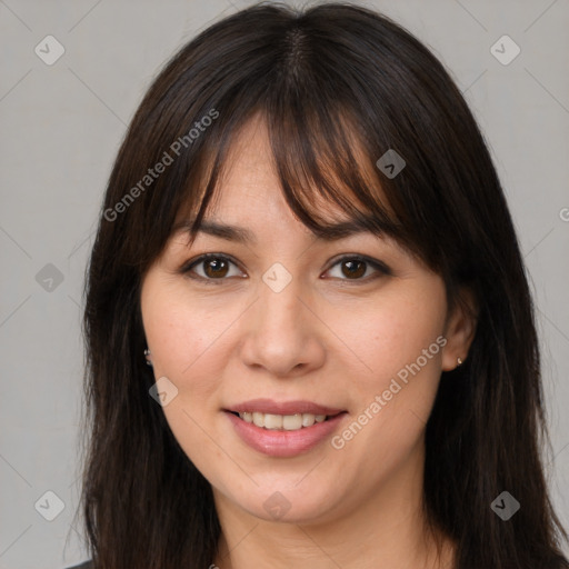 Joyful white young-adult female with long  brown hair and brown eyes