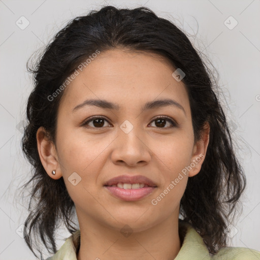 Joyful latino young-adult female with medium  brown hair and brown eyes