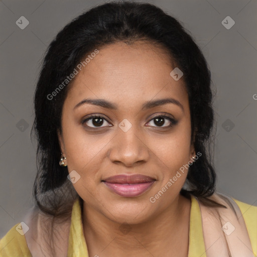 Joyful black young-adult female with long  brown hair and brown eyes