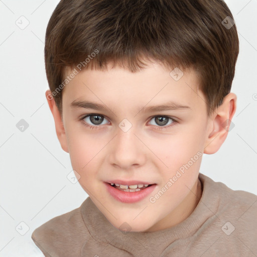 Joyful white child male with short  brown hair and brown eyes