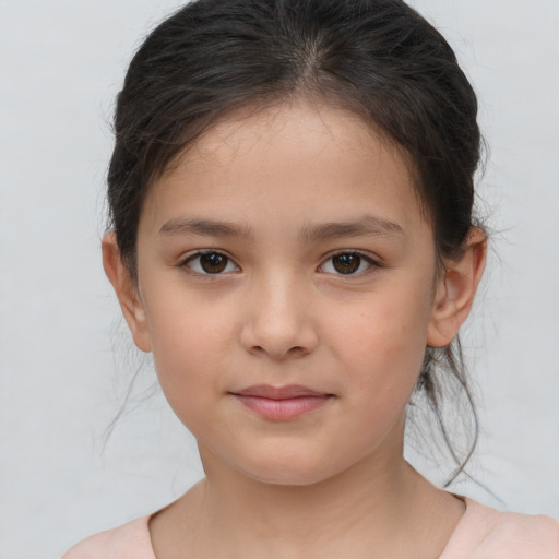Joyful white child female with medium  brown hair and brown eyes
