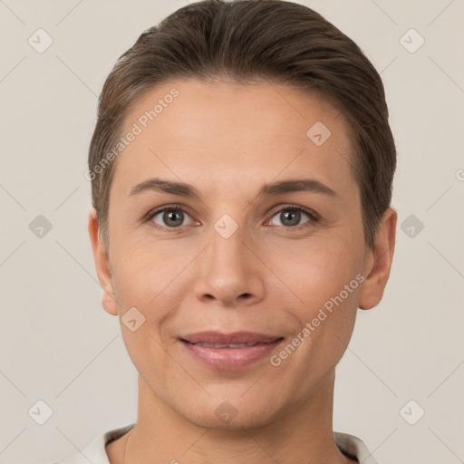 Joyful white young-adult female with short  brown hair and brown eyes