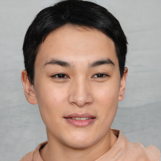 Joyful asian young-adult male with short  brown hair and brown eyes