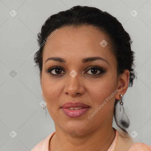 Joyful latino young-adult female with short  brown hair and brown eyes