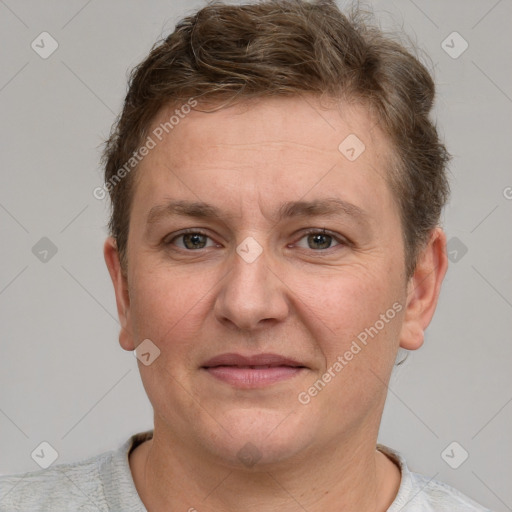 Joyful white adult male with short  brown hair and grey eyes