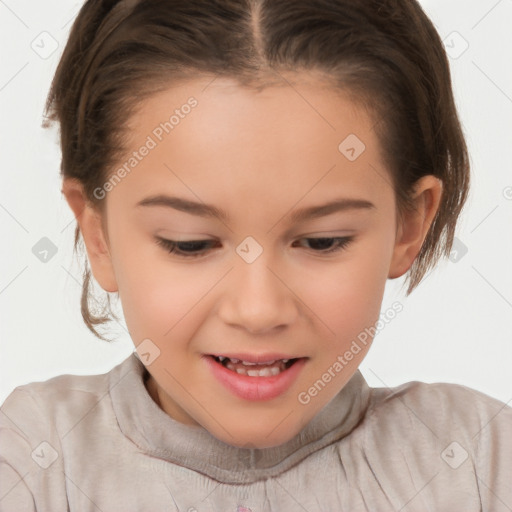 Joyful white child female with short  brown hair and brown eyes