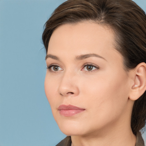 Neutral white young-adult female with medium  brown hair and brown eyes