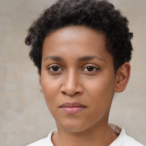 Neutral black young-adult female with short  brown hair and brown eyes