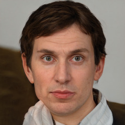 Neutral white adult male with short  brown hair and brown eyes