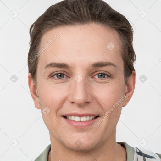 Joyful white young-adult female with short  brown hair and grey eyes