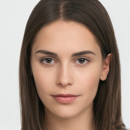 Neutral white young-adult female with long  brown hair and brown eyes