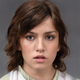 Neutral white young-adult female with medium  brown hair and brown eyes