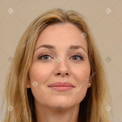 Joyful white young-adult female with long  brown hair and brown eyes