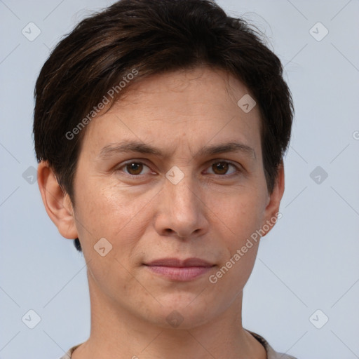 Joyful white adult female with short  brown hair and brown eyes