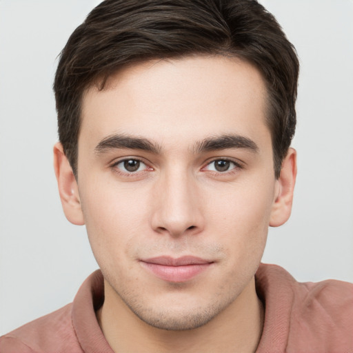 Neutral white young-adult male with short  brown hair and brown eyes