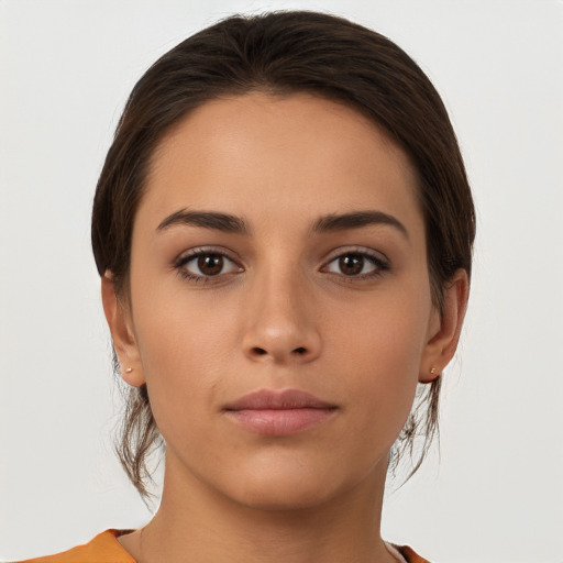 Neutral white young-adult female with medium  brown hair and brown eyes