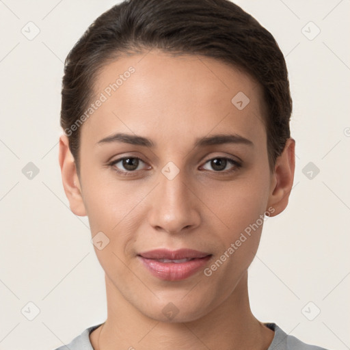 Joyful white young-adult female with short  brown hair and brown eyes