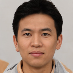 Neutral asian young-adult male with short  black hair and brown eyes