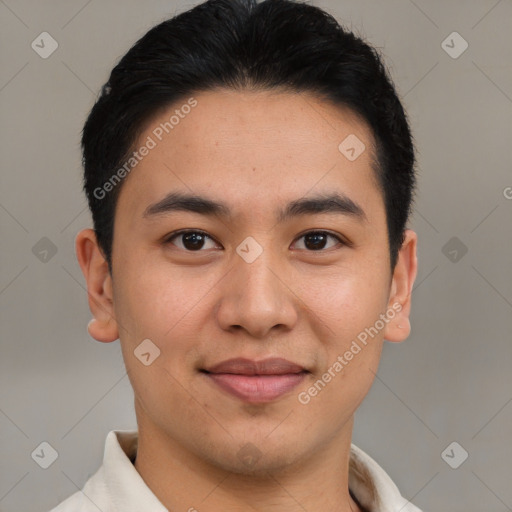 Joyful latino young-adult male with short  brown hair and brown eyes