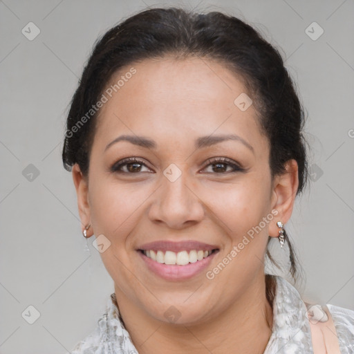 Joyful latino adult female with medium  brown hair and brown eyes