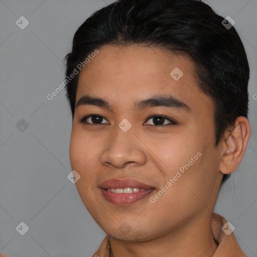 Joyful asian young-adult male with short  black hair and brown eyes