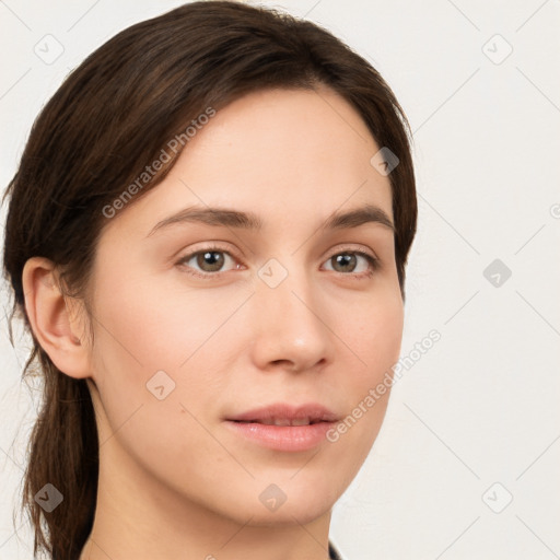 Neutral white young-adult female with long  brown hair and brown eyes