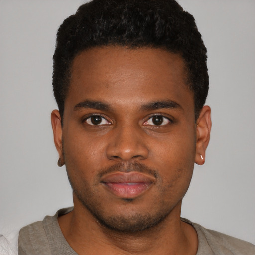 Neutral black young-adult male with short  brown hair and brown eyes