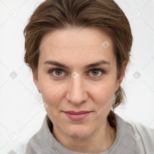 Joyful white adult female with medium  brown hair and grey eyes