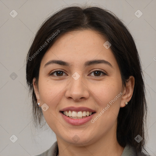 Joyful white young-adult female with medium  brown hair and brown eyes