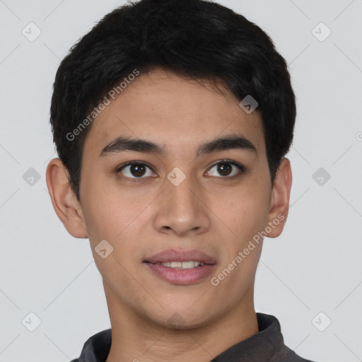 Joyful latino young-adult male with short  brown hair and brown eyes