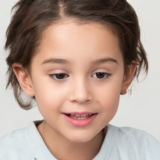 Joyful white child female with medium  brown hair and brown eyes