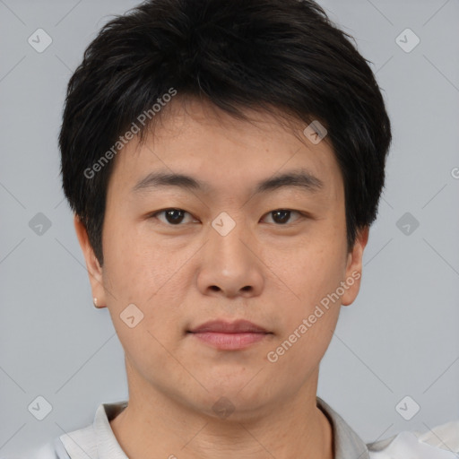 Neutral asian young-adult male with short  brown hair and brown eyes