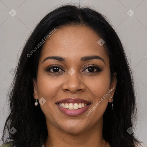 Joyful latino young-adult female with long  brown hair and brown eyes