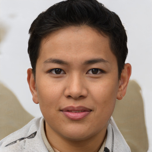 Joyful asian young-adult female with short  brown hair and brown eyes