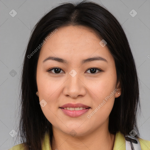 Joyful latino young-adult female with long  brown hair and brown eyes